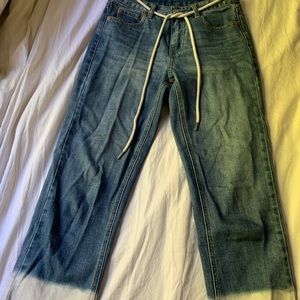 blue jeans with dipped white bottoms